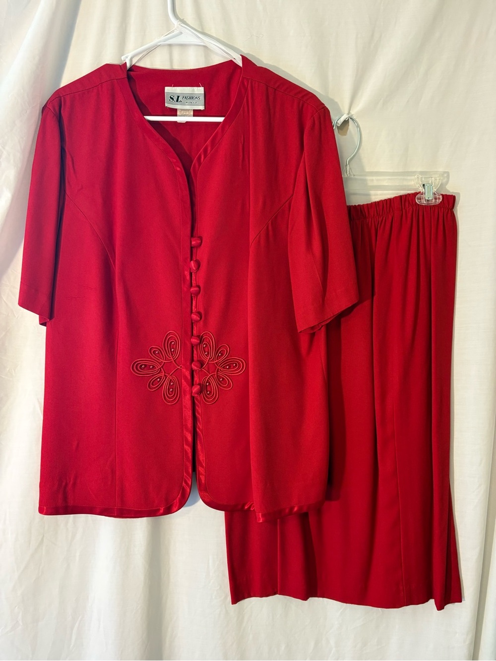 S.L. Fashions Red Two-Piece Short Sleeve Skirt Set with Embroidered Front